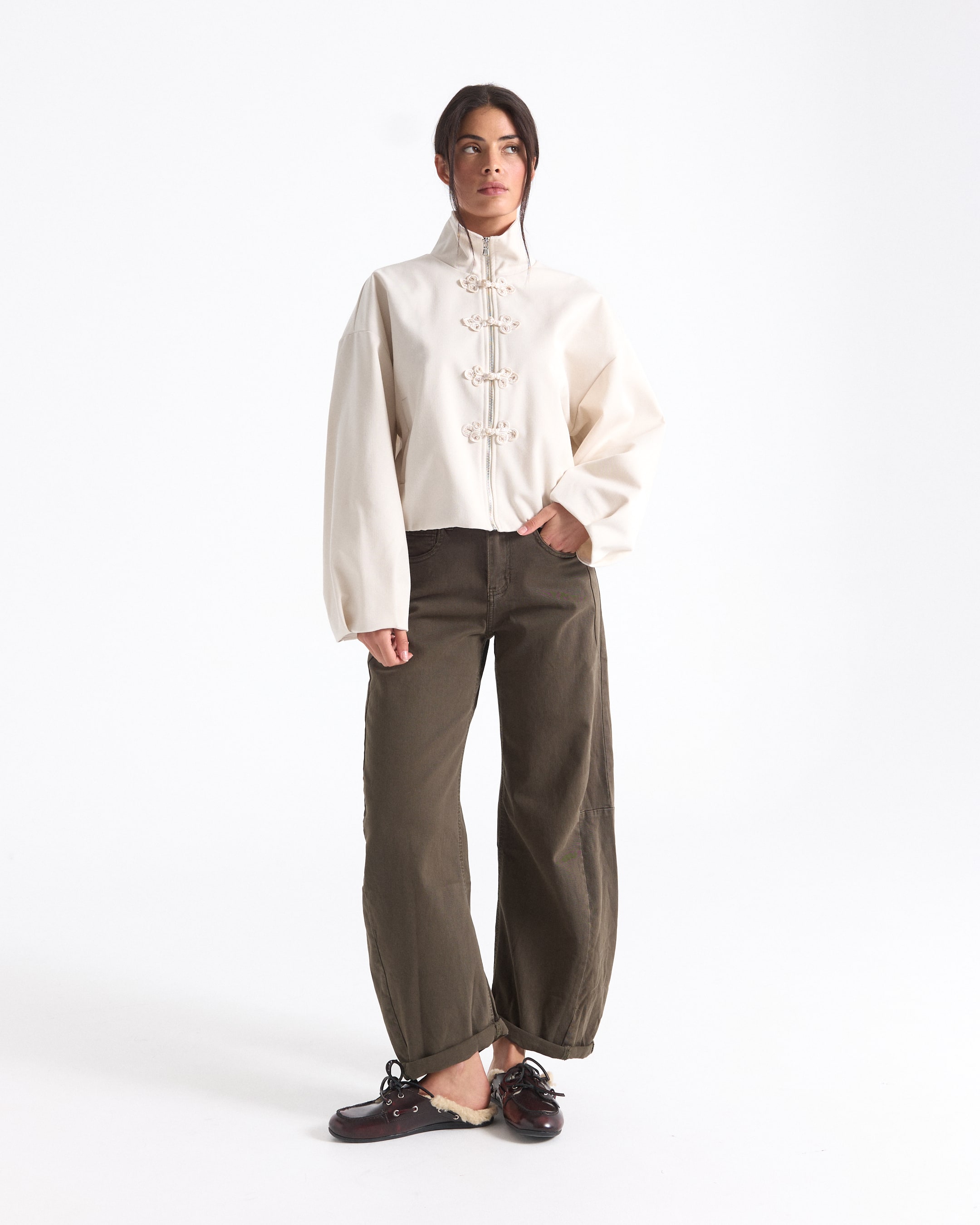 top, blouse, fleece, lantern-sleeve, khaki-pants, lace-up-closure, high-neck, pompom-closure