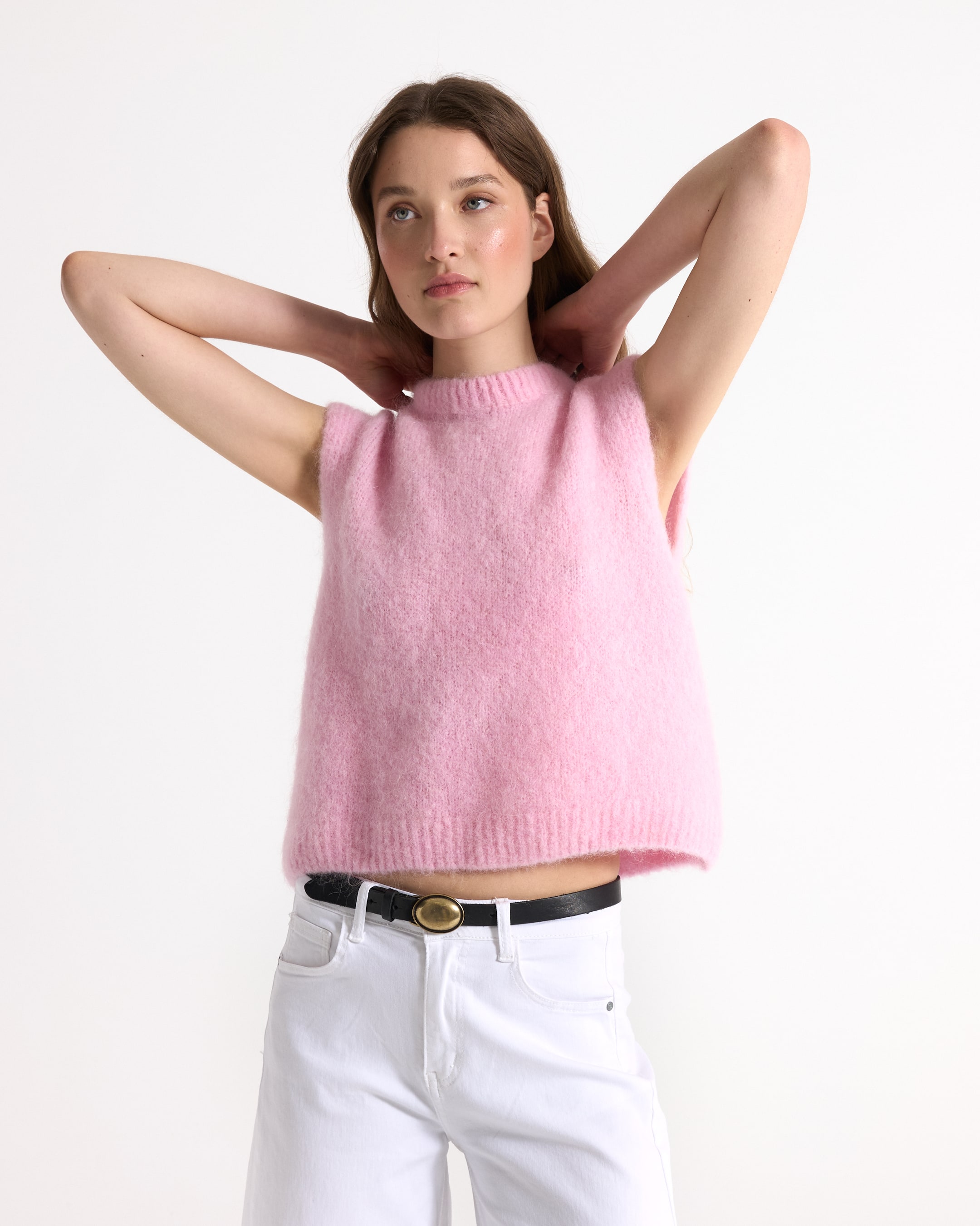 roze trui, brei top, vingerloos, zachte textuur, lichtroze