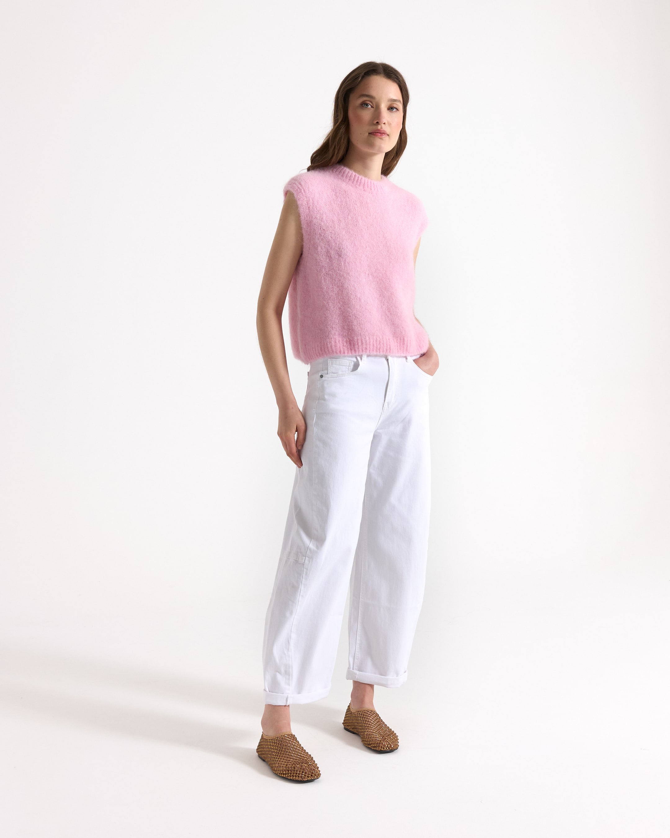 roze trui, brei vest, mouwloos, vette textuur, lichte roze